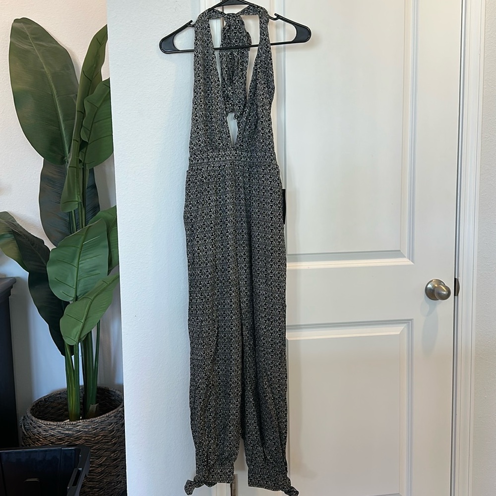 NWT Lulus Halter Jumpsuit. Size Small. Black/white. Has pockets. Never worn.
